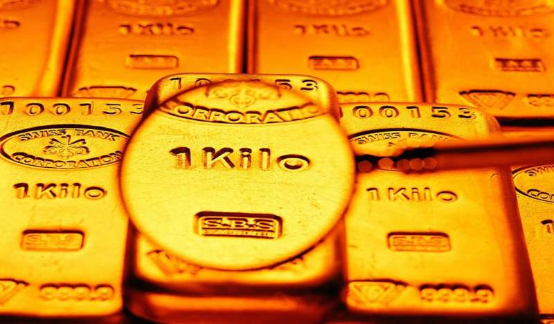 Precios del oro caen debido a mayor apetito de inversionistas por acciones